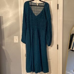 Emerald green ruched midi dress